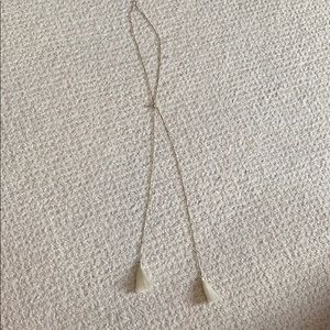 a gold tassels adjustable necklace